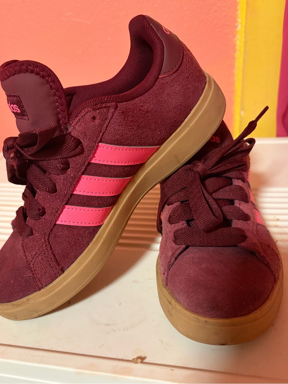 Nike woman 
Maroon Suede Sneakers with Pink Stripes